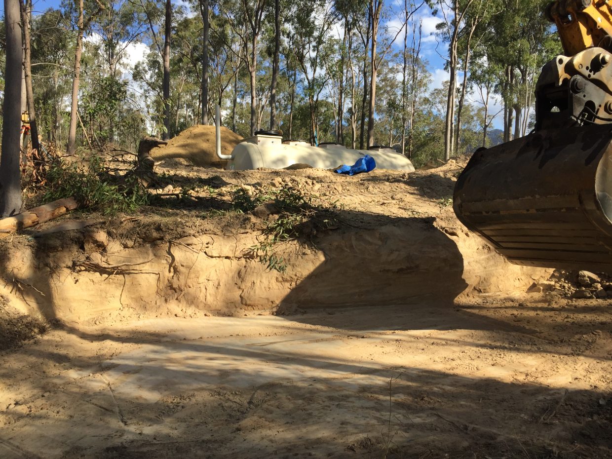 Precision excavation was important during installation to ensure the STP for the campground did not adversely impact the established environment.