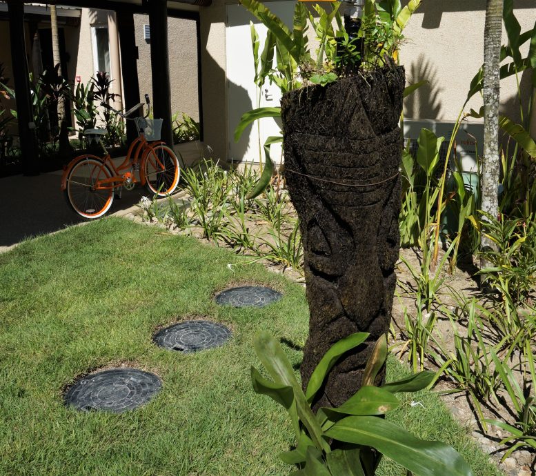 Small sewage treatment plants service each villa and are hidden within the landscaping