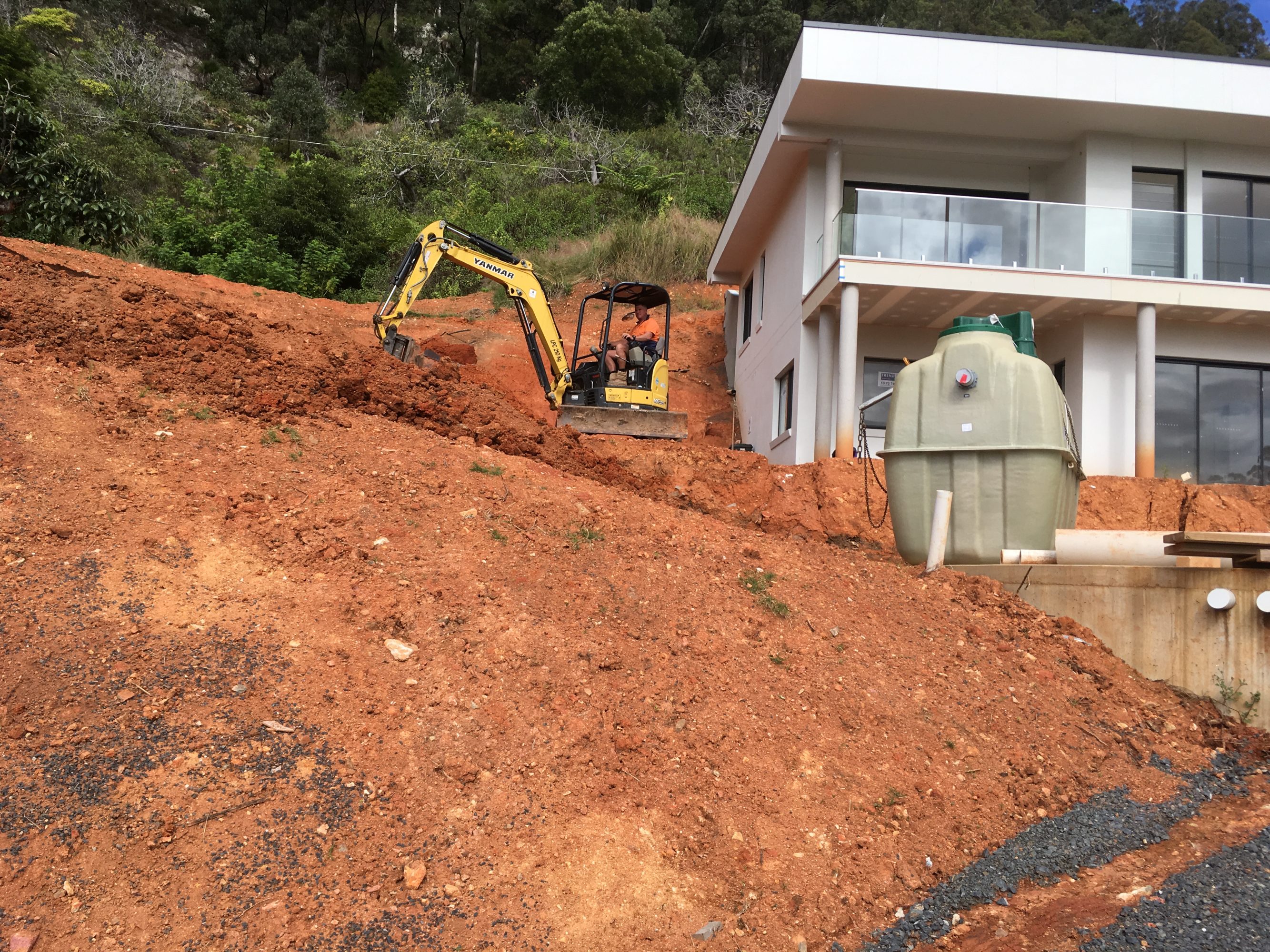 Installing a Fuji Clean home sewage treatment system in the Korora hills near Coffs Harbour is an exercise in precision.