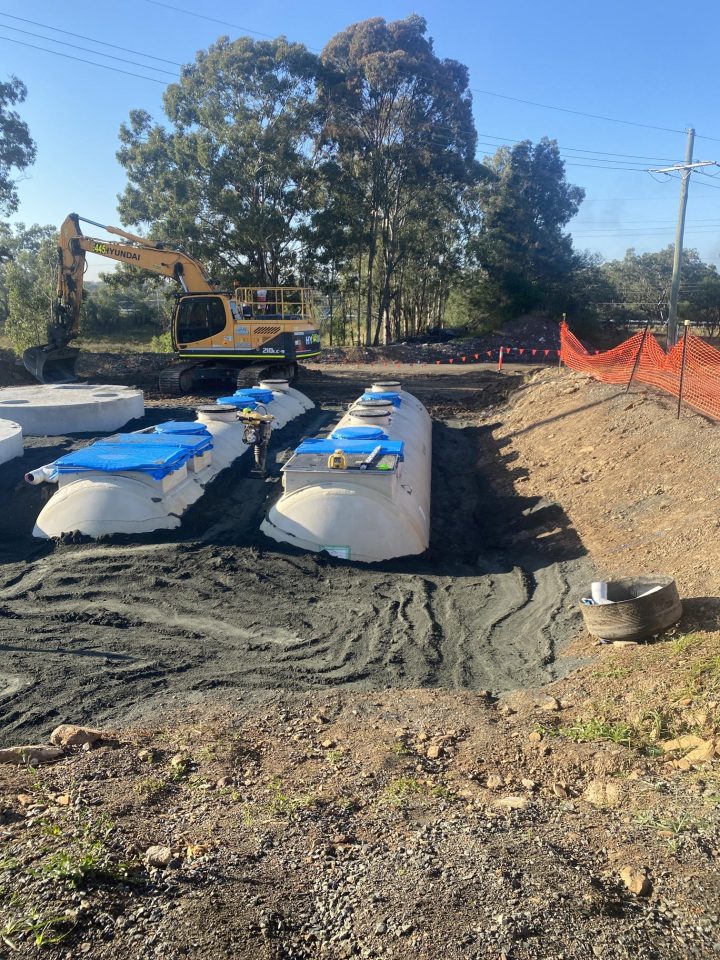 Once all underground components are implace, they are connected and tested before final backfill.