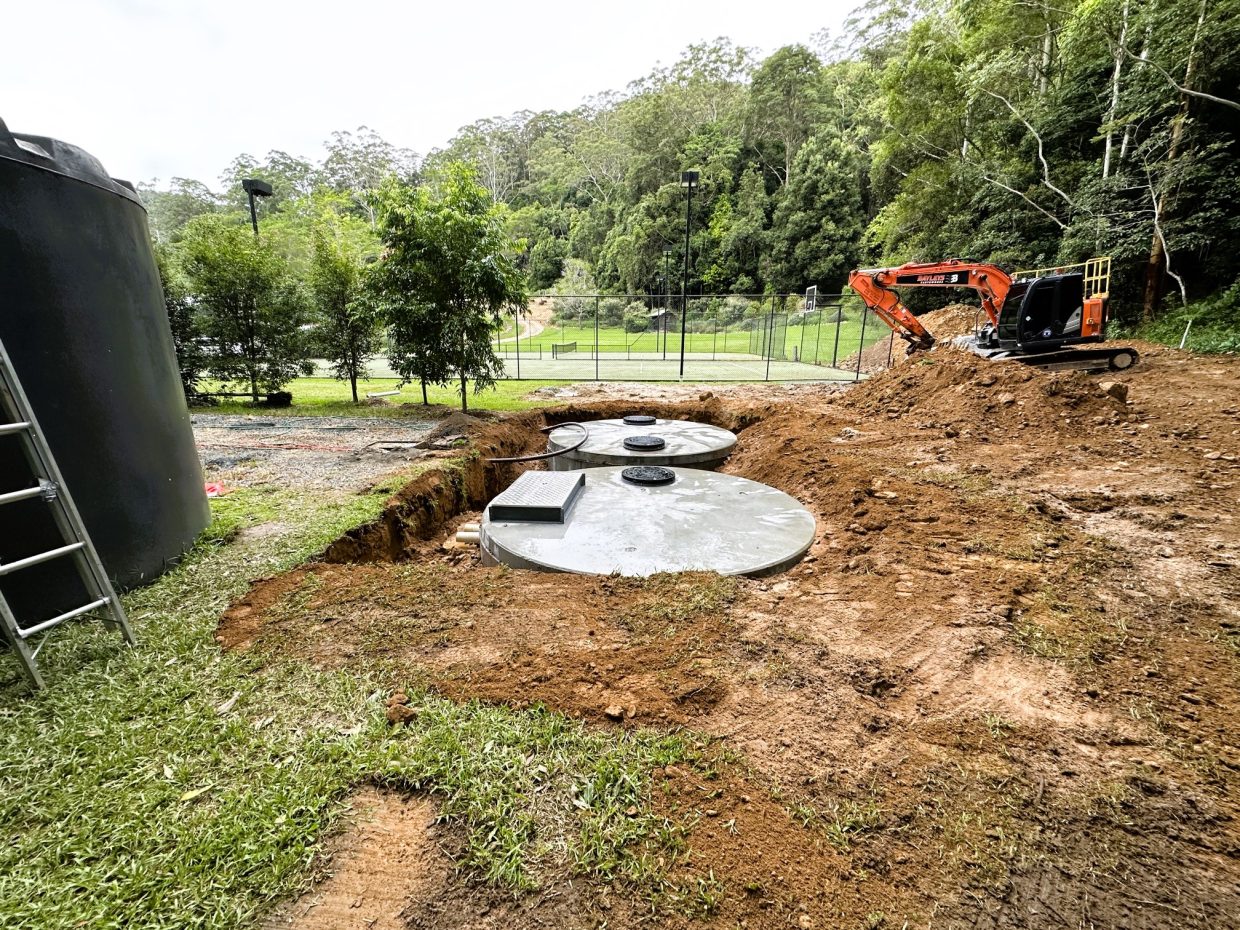 The EQ tanks were connected to existing infrastructure and the site restored to level.