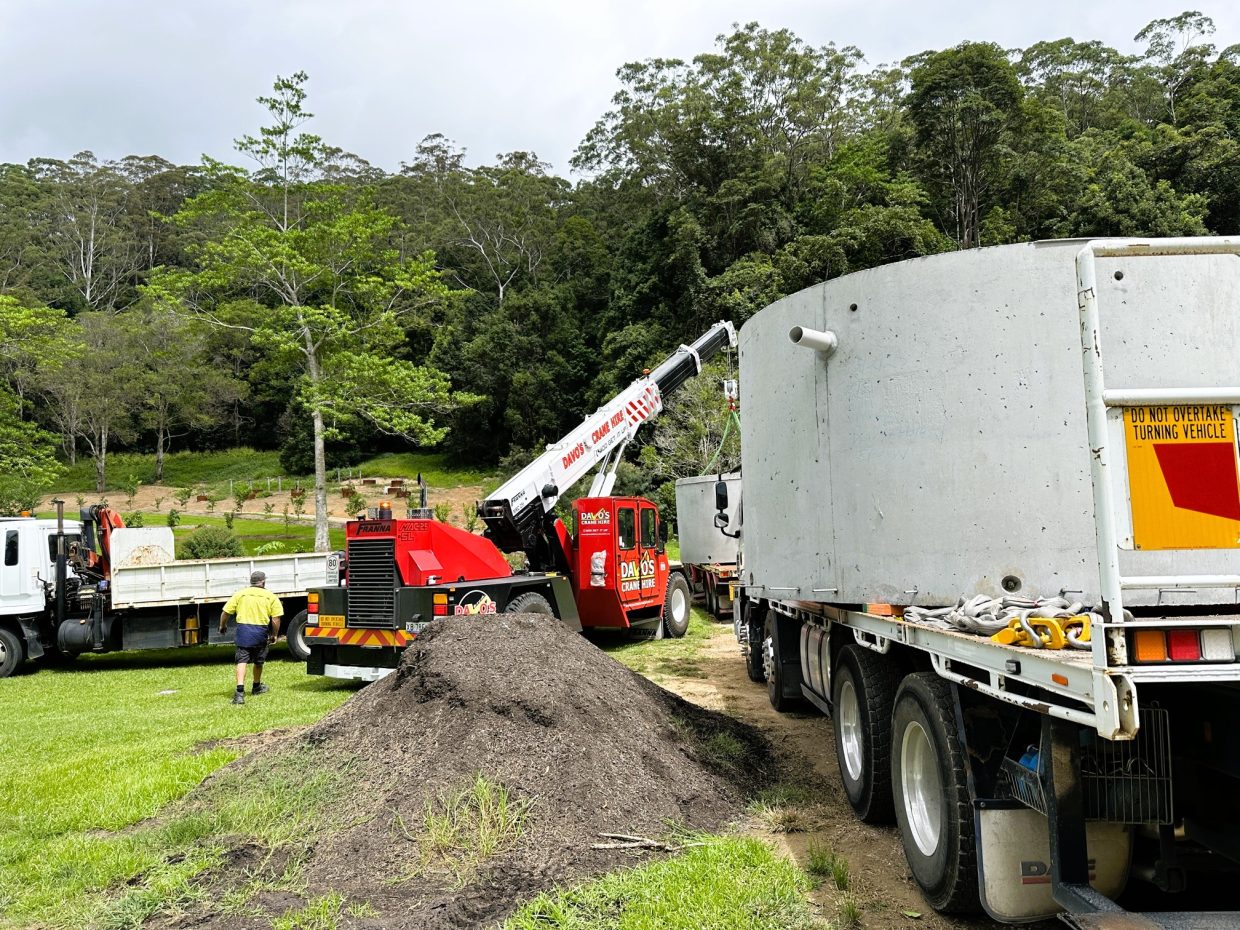 The EQ tanks were expertly craned into position.