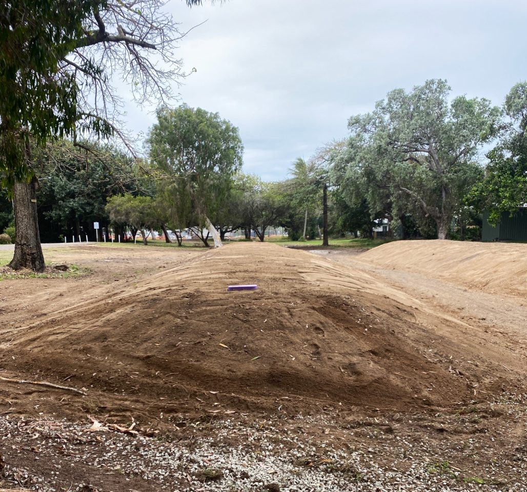 Constructing engineered mounds for dispersl of treated wastewater.