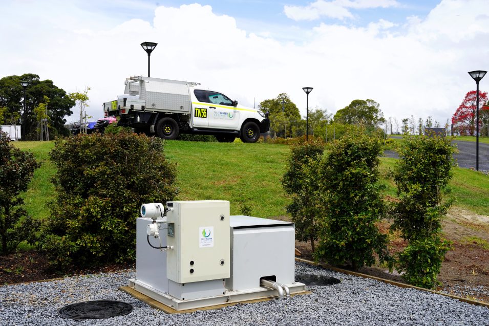 A truck parked beside a remote asset telemetry system.