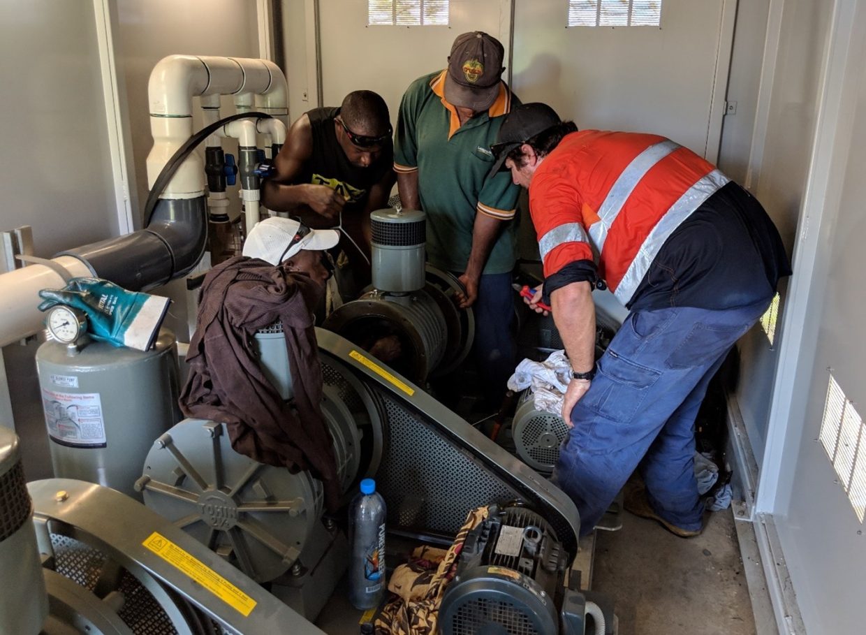 A True Water technician conducts onsite training during a scheduled maintenance visit.